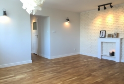 Mieszkanie w Warszawie na Mokotowie, salon z kuchnią.